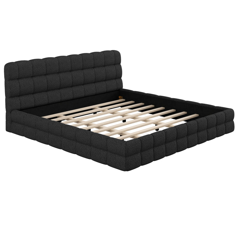 Dreamland upholstered platform bed with padded headboard and sleek frame, showcasing a modern bedroom setup.