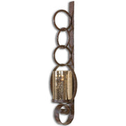 Dark brown metal wall sconce from Uttermost Falconara wall decor, featuring a sleek, modern design for stylish interior lighting.