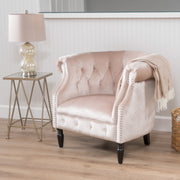 Noble House Celestialis upholstered club arm chair with tub design, rolled recessed armrests, and plush fabric in a cozy living room setting.