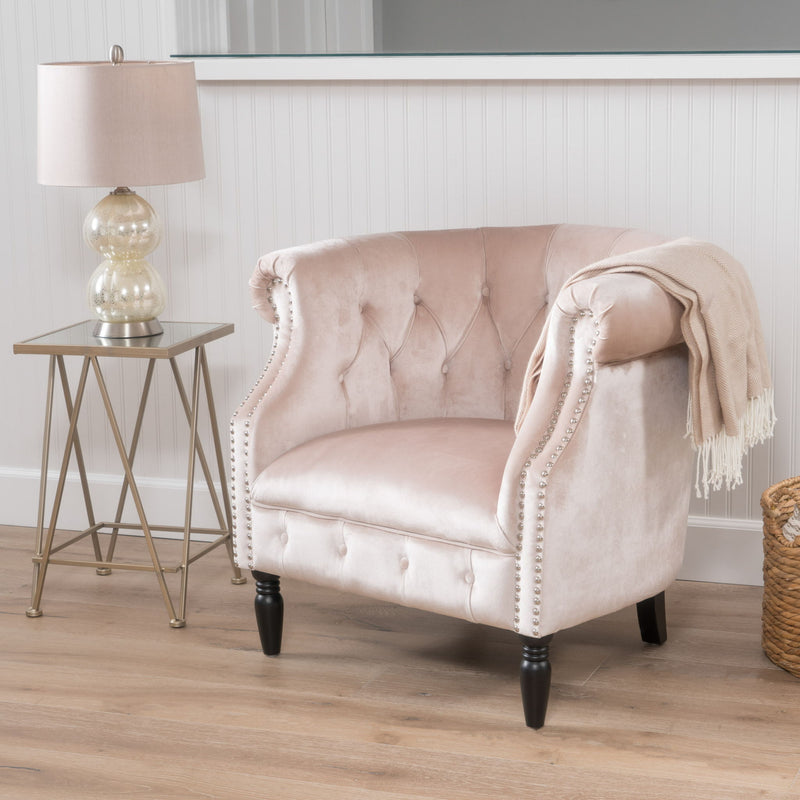 Noble House Celestialis upholstered club arm chair with tub design, rolled recessed armrests, and plush fabric in a cozy living room setting.