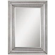 Uttermost Seymour antique silver wall mirror with a sleek, rectangular frame, reflecting a modern and elegant decor style.