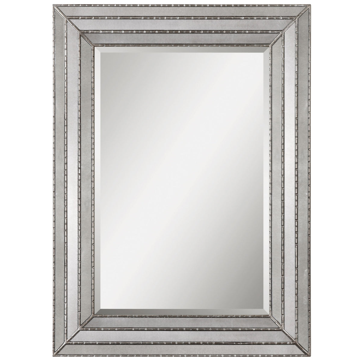 Uttermost Seymour antique silver wall mirror with a sleek, rectangular frame, reflecting a modern and elegant decor style.