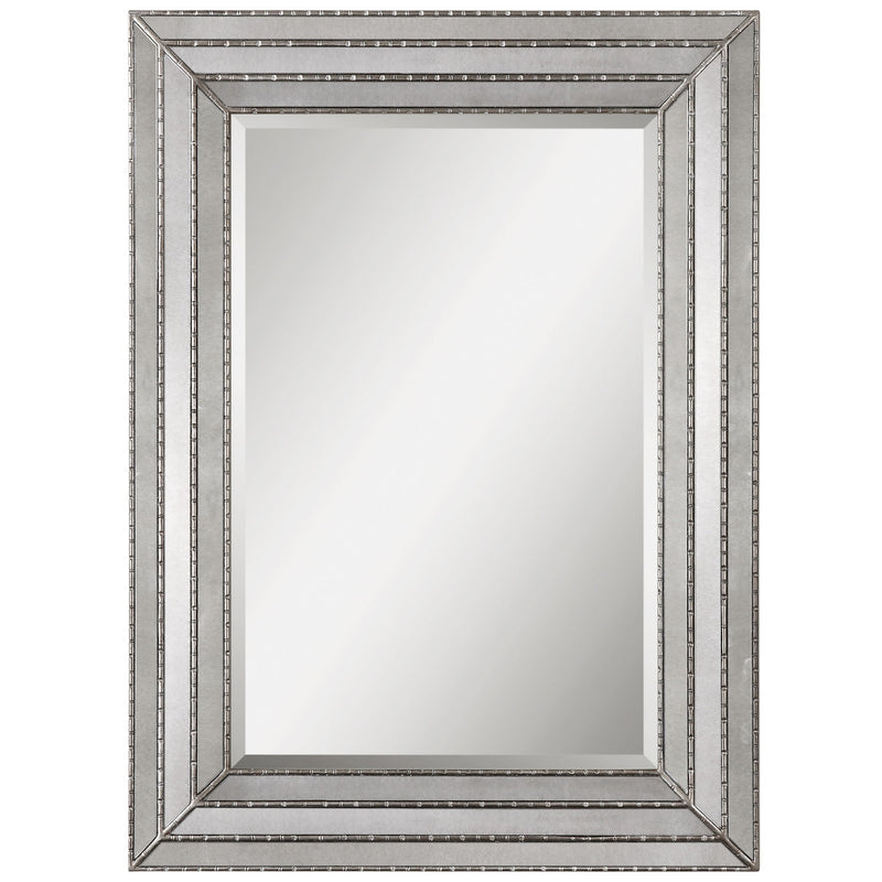 Uttermost Seymour antique silver wall mirror with a sleek, rectangular frame, reflecting a modern and elegant decor style.