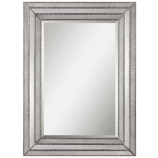 Uttermost Seymour antique silver wall mirror with a sleek, rectangular frame, reflecting a modern and elegant decor style.