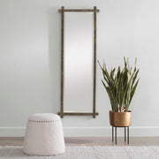 Uttermost Abanu ribbed dressing mirror with a sleek, modern vanity mirror design suitable for bedroom or dressing area.
