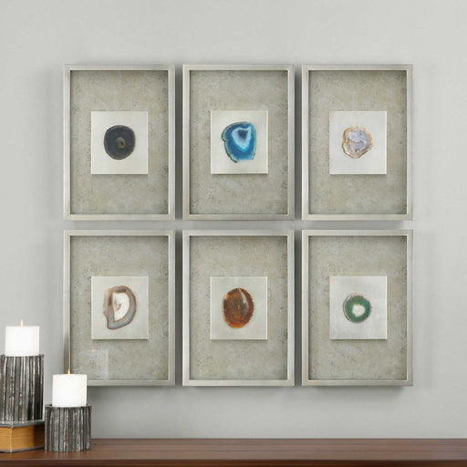 Set of six silver agate stone wall art pieces by Uttermost, showcasing natural agate textures and layered designs for wall decor.