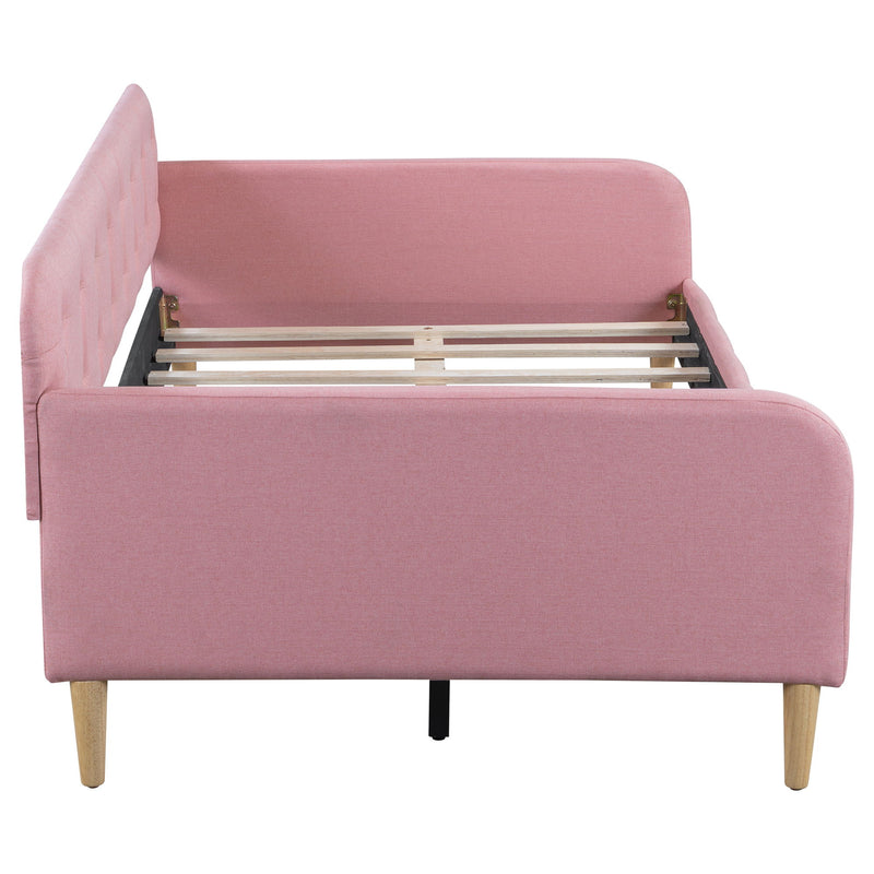 Modern Dreamland upholstered daybed with plush cushions and sleek frame, perfect for stylish living room or guest space.