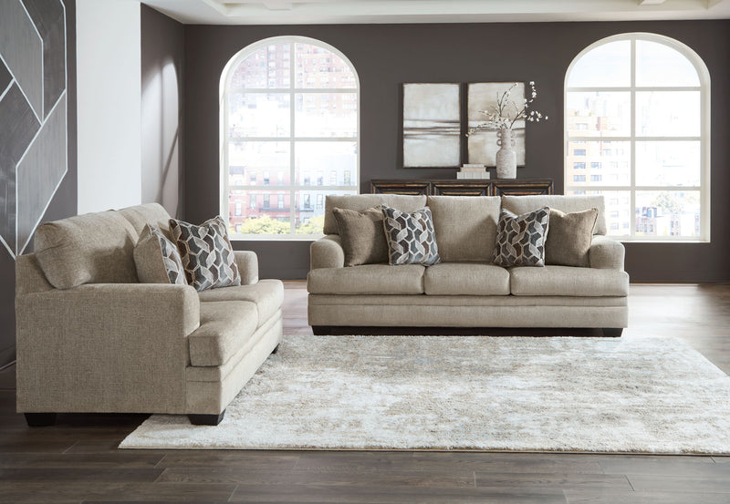 Three-piece Stonemeade living room set by Signature Design Ashley with a sofa and two armchairs in a modern living space.