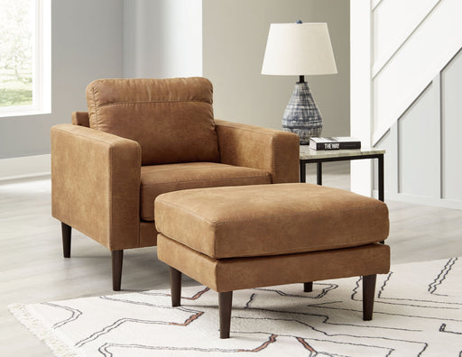 Signature Design by Ashley Telora living room set with stationary chair and ottoman in cozy fabric, perfect for modern home decor.