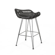 Noble House outdoor rattan bar stool with metal legs, featuring a stylish woven rattan seat and sturdy metal frame for outdoor use.