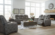 Signature Design by Ashley Next-Gen Durapella reclining sofa and loveseat set in a modern living room with plush cushions and reclining features.