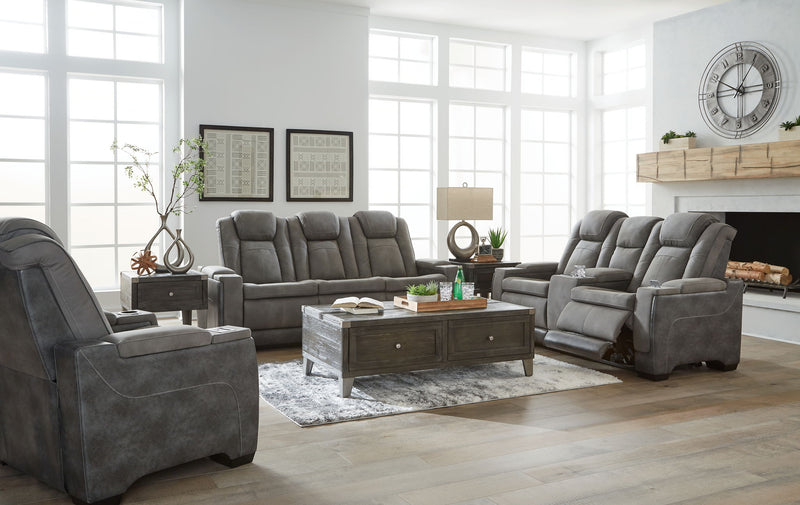 Signature Design by Ashley Next-Gen Durapella reclining sofa and loveseat set in a modern living room with plush cushions and reclining features.