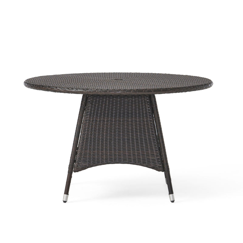 Round dining table by Noble House in warm brown wood finish, ideal for modern dining rooms.