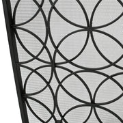 Noble House Thayer single panel iron fireplace screen with geometric design and black finish, protecting fireplace opening.