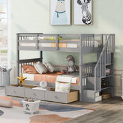 DreamHaus stairway bunk bed with built-in storage drawers and safety guard rail for bedroom use, featuring sturdy wood construction.