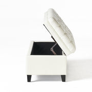 Noble House Juliana storage ottoman with birch wood legs, upholstered in soft fabric, serving as functional seating and storage.