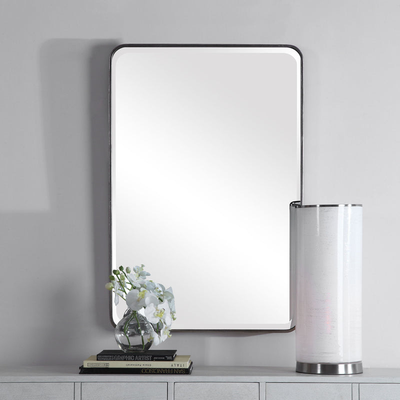 Uttermost silver wall mirror with a sleek, modern frame, perfect for contemporary home decor.