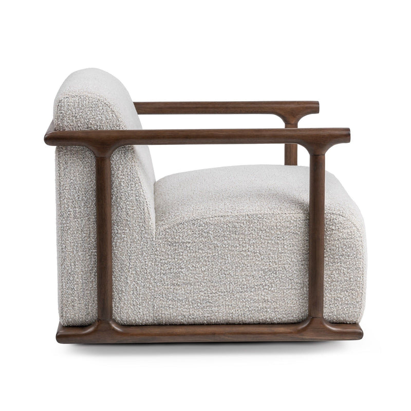 Classic Home Lucia swivel chair with plush fabric upholstery and a modern design, shown in a cozy living room setting.