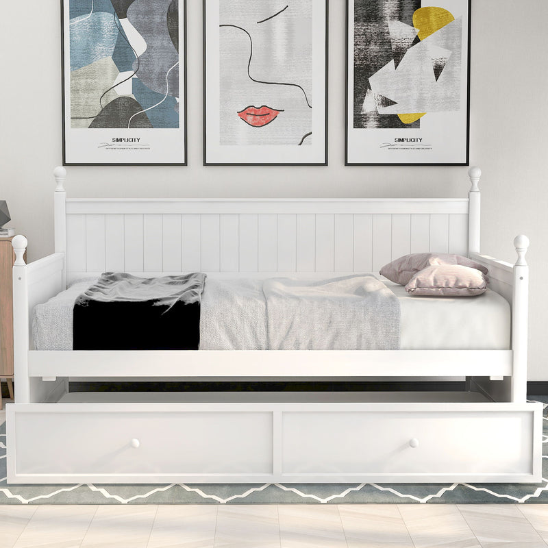 White twin size daybed with matching trundle bed from DreamHaus, featuring a modern design and clean lines.
