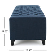 Noble House Guernsey storage ottoman with tufted top and wooden legs, used for extra seating or hidden storage in living room.