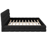 Dreamland upholstered platform bed with a padded headboard, showcasing a modern design and neutral fabric upholstery.