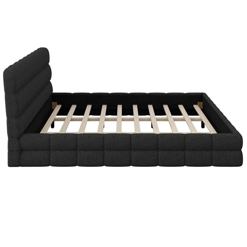 Dreamland upholstered platform bed with a padded headboard, showcasing a modern design and neutral fabric upholstery.