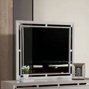 Silver champagne Alana mirror by Glory Furniture featuring a sleek, elegant frame with reflective glass.