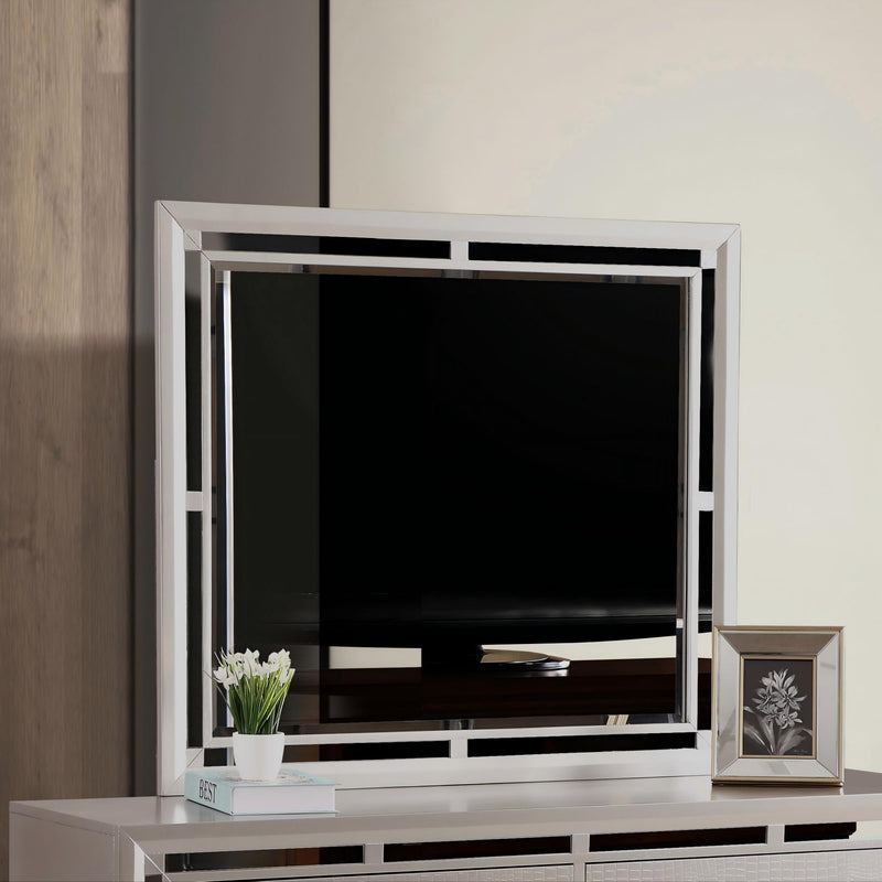 Silver champagne Alana mirror by Glory Furniture featuring a sleek, elegant frame with reflective glass.