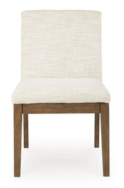 Set of two Benchcraft Marxmore dining upholstered side chairs in beige and brown with cushioned seats and wooden legs.