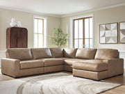 Benchcraft Veronella stationary sectional sofa with plush cushions and modern design, shown in a cozy living room setting.