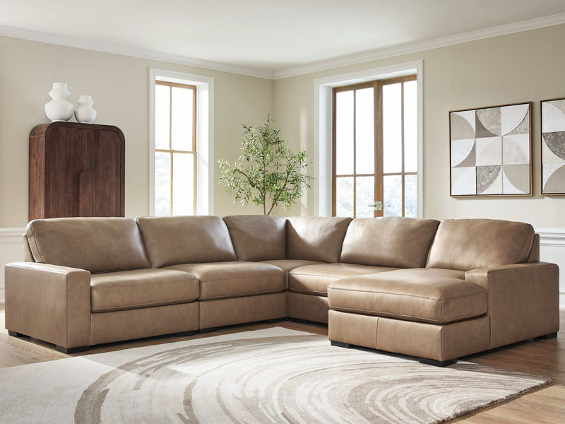 Benchcraft Veronella stationary sectional sofa with plush cushions and modern design, shown in a cozy living room setting.