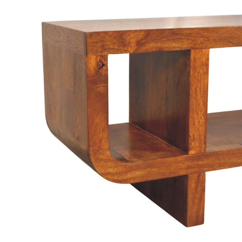 Artisan Furniture Orion curved media unit in brown with open shelves and storage compartments for TV and media accessories.