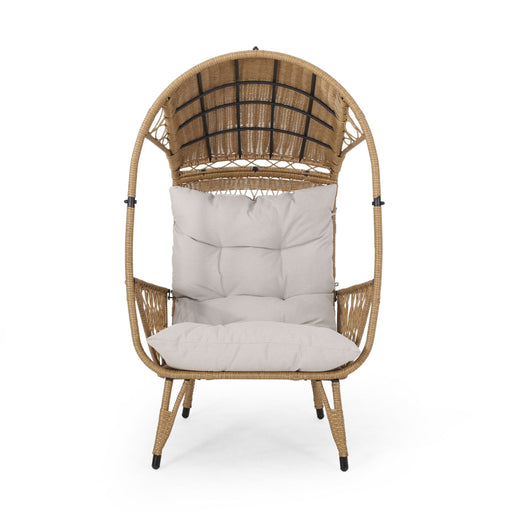 Noble House outdoor wicker standing basket chair with cushion, accent chair featuring a woven wicker frame and plush seat cushion.