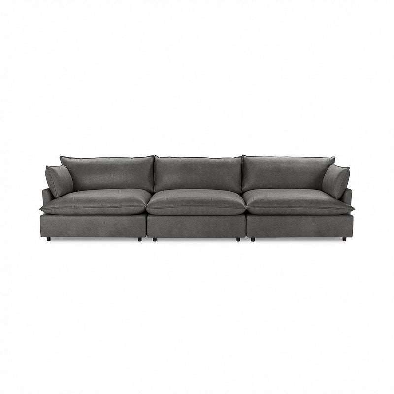 Classic Home Caplan modular sectional in neutral fabric, showcasing its spacious, stylish stationary design with plush cushions.