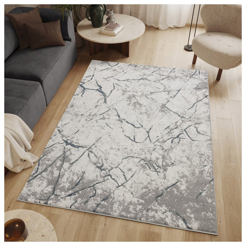 Geometrix - 7'10" X 10'6" Area Rug, Geometric 3D Effect - Ivory / Gray - R&R Furniture Gallery (Fountain Valley, CA)