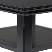 Handcrafted Acadian end table by Simpli-Home featuring a wooden surface and tapered legs, ideal for living room or bedroom decor.