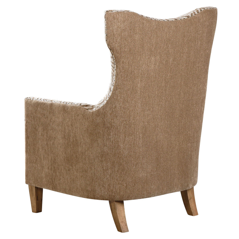 Light brown animal pattern armchair by Uttermost featuring a plush cushioned seat and stylish armrests.