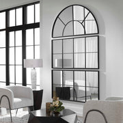 Black iron window mirror by Uttermost featuring a vintage-inspired accent mirror with a rectangular frame and grid design.