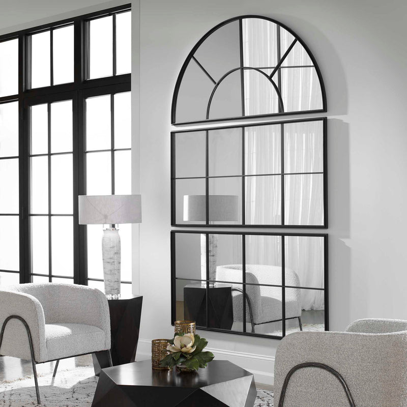 Black iron window mirror by Uttermost featuring a vintage-inspired accent mirror with a rectangular frame and grid design.