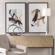 Set of two Burgundy and dark brown abstract canvas art prints by Uttermost, featuring modern, expressive design for wall decor.
