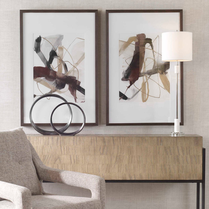Set of two Burgundy and dark brown abstract canvas art prints by Uttermost, featuring modern, expressive design for wall decor.