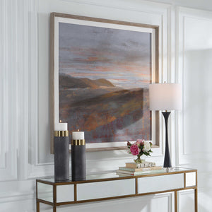 Framed print titled "Dawn On The Hills" by Uttermost, featuring a purple landscape scene with a decorative frame.