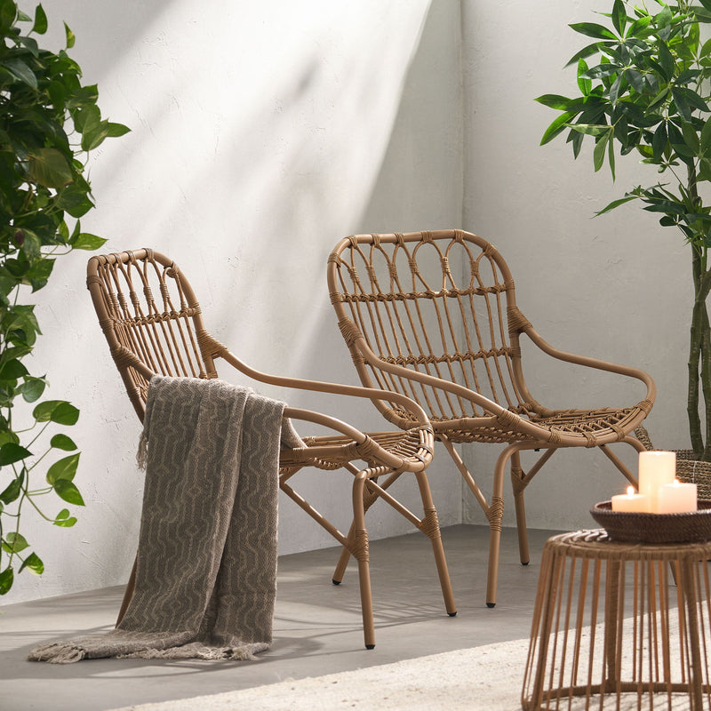 Noble House Monsoon outdoor accent chair with open weave design, featuring a stylish and comfortable seating option for outdoor spaces.
