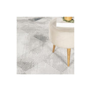 Geometrix - 5'3" X 7'3" Area Rug With Geometric, 3D Effect - Gray / Ivory - R&R Furniture Gallery (Fountain Valley, CA)