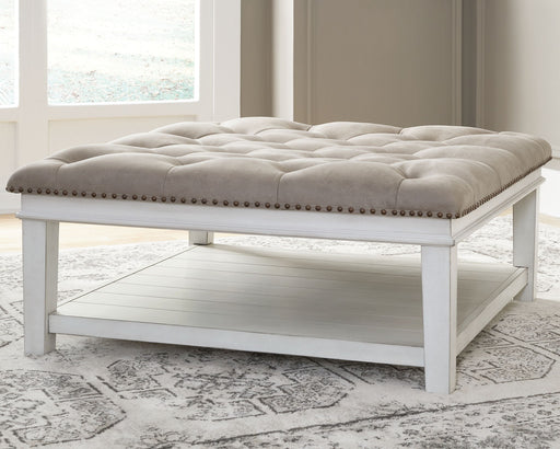 Kanwyn - Uph Ottoman Cocktail Table - Whitewash - R&R Furniture Gallery (Fountain Valley, CA)