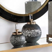 Pair of dark gray art glass bottles vases from Uttermost Cessair collection, featuring sleek, modern design for decorative use.