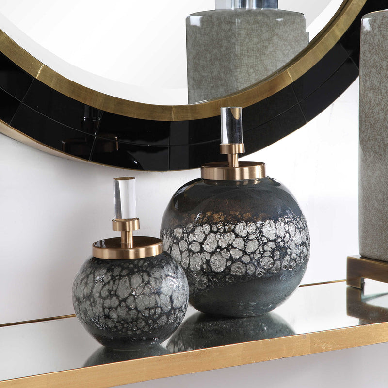 Pair of dark gray art glass bottles vases from Uttermost Cessair collection, featuring sleek, modern design for decorative use.