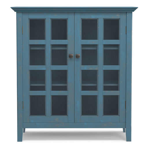 Handcrafted Simpli-Home Acadian medium accent storage cabinet with wooden doors and vintage style, ideal for home organization.