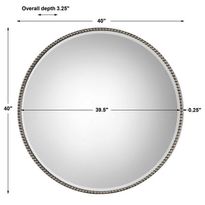Beaded round wall mirror with pearl silver frame by Uttermost, featuring intricate beaded detailing and a reflective glass surface.