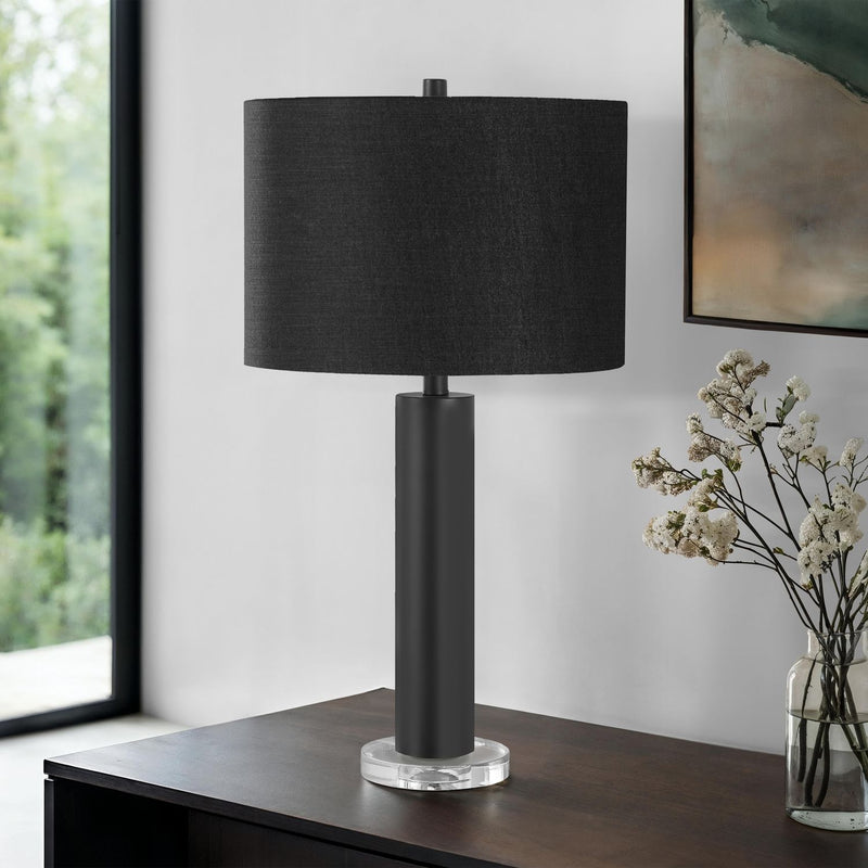 Contemporary 8th Street table lamp with sleek design and neutral-colored lampshade, perfect for modern living spaces